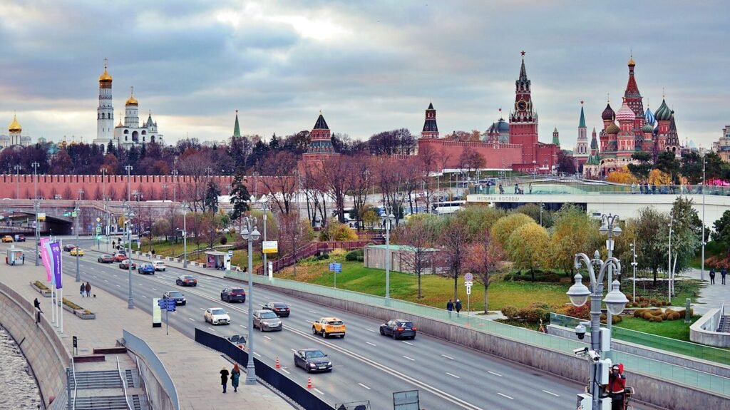 Moscow's skyline, including the kremlin, is visible.